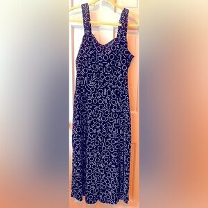 Cute Jumpsuit! Look at this beautiful navy/white jumpsuit by 1. State. Medium